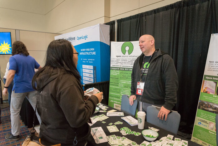 Patrick Masson, then general manager of Open-Source Initiative at OSI's booth.
