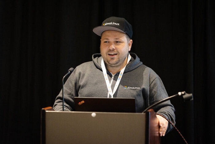 Jack Aboutboul, community manager at AlmaLinux Foundation giving a presentation at All Things Open 2022.