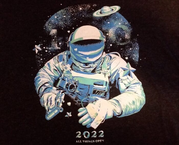 All Things Open 2022 T-shirt design, with a spaceman of course.