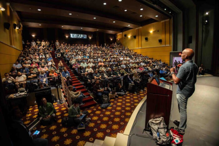 Netflix's Ben Ilegbodu speaking before an SRO audience in Cinema 1. "Breakout rooms were packed all day long," Todd Lewis said.
