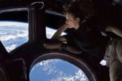Tracy Caldwell Dyson, a NASA astronaut, observing Earth from the Cupola module at the International Space Station on 11 September 2010.