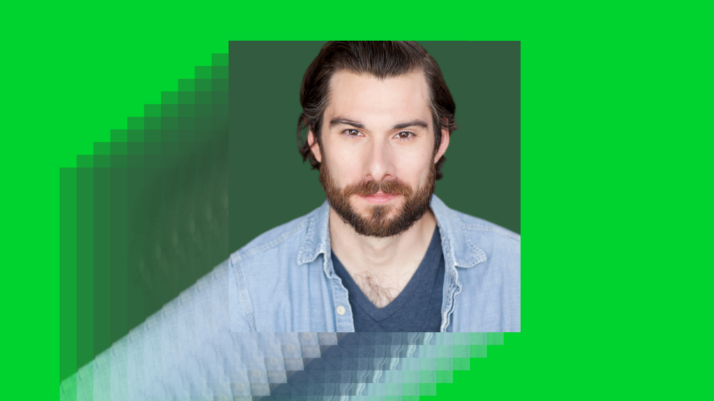 A bearded man in a denim shirt over a dark T-shirt, against a green background with a layered pixel effect.